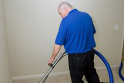 men cleaning floor