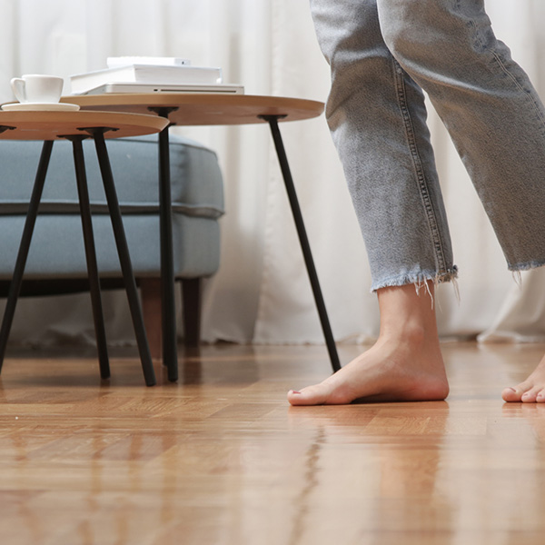 woman standing in kitchen floor